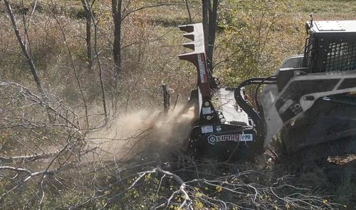 Virnig V70 Drum Mulcher attachment for skid steer clearing dense vegetation
